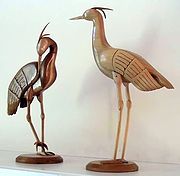 Artists can use wood to create delicate sculptures.